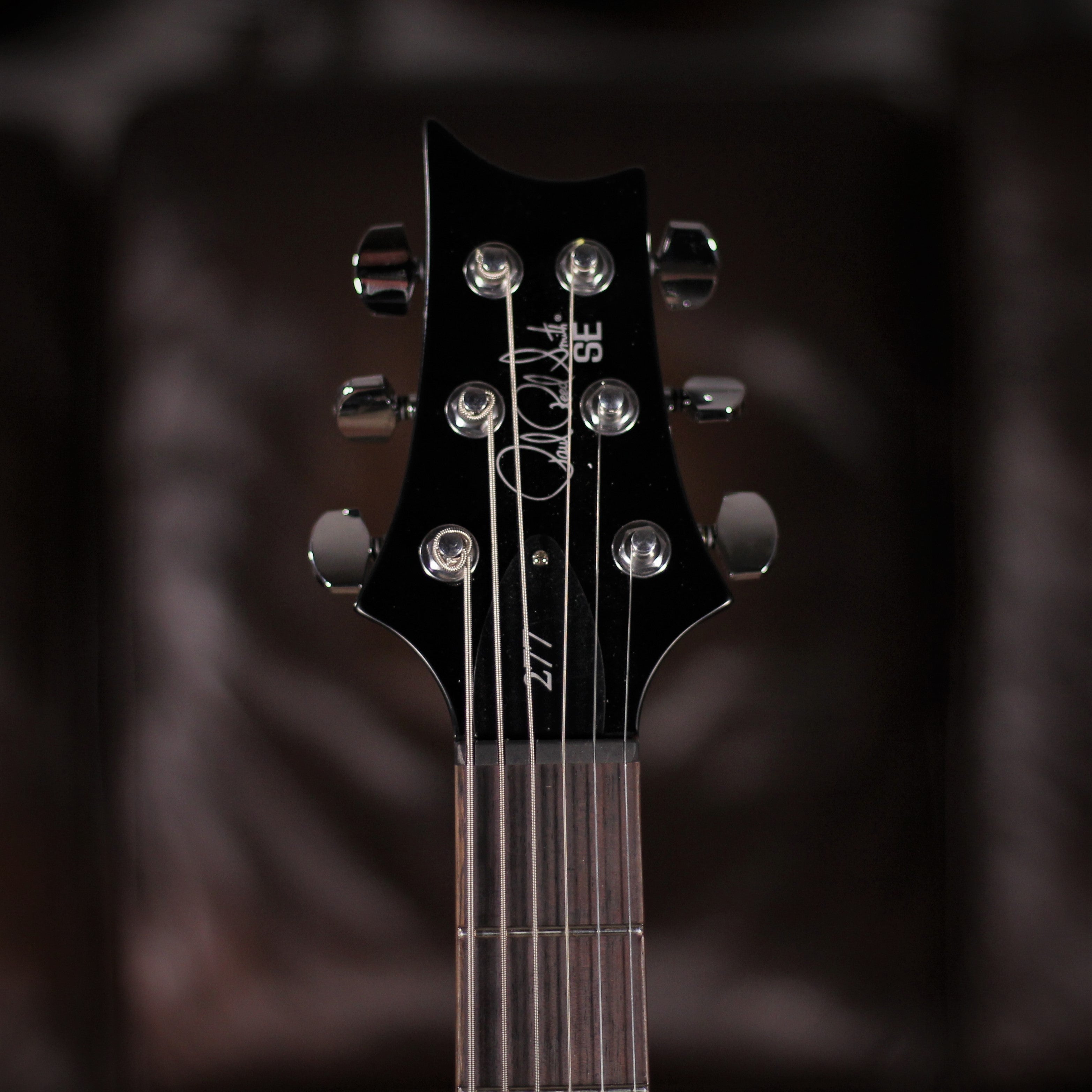 PRS SE 277 Charcoal Burst headstock